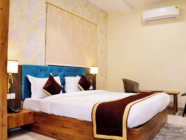 Imagen de la habitación del Hotel Tulsi Grand Inn. Foto 7