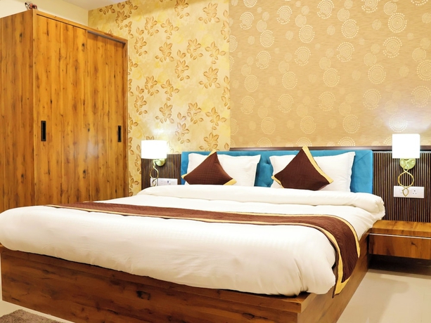 Imagen de la habitación del Hotel Tulsi Grand Inn. Foto 8
