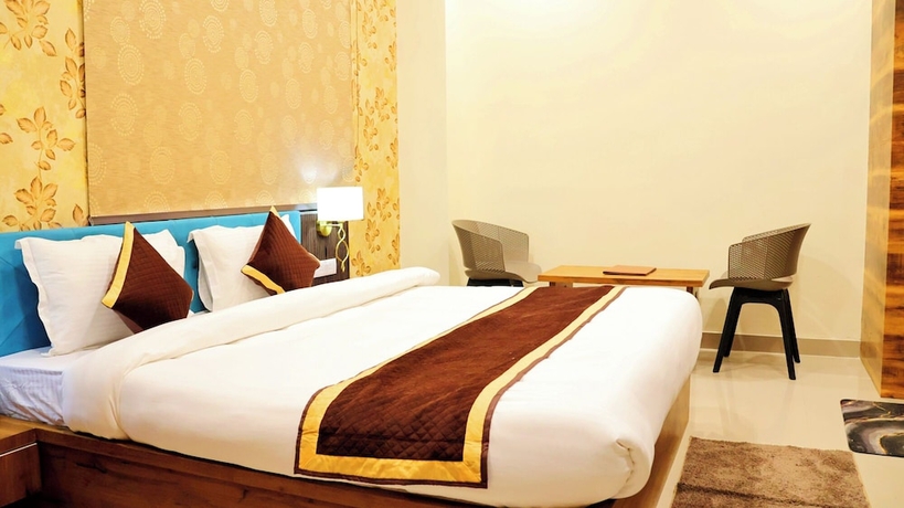 Imagen de la habitación del Hotel Tulsi Grand Inn. Foto 9