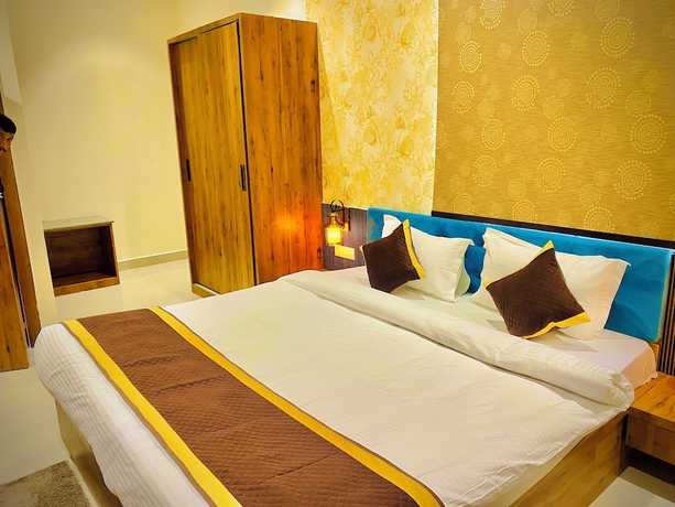 Imagen de la habitación del Hotel Tulsi Grand Inn. Foto 12