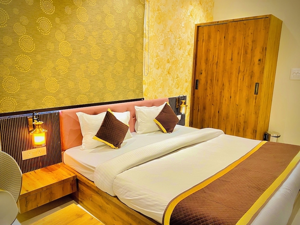 Imagen de la habitación del Hotel Tulsi Grand Inn. Foto 13