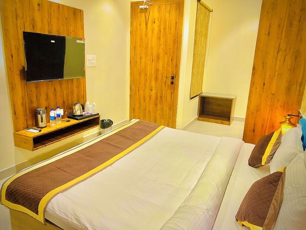 Imagen de la habitación del Hotel Tulsi Grand Inn. Foto 14
