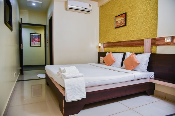 Imagen de la habitación del Hotel Tulsi Residency. Foto 11