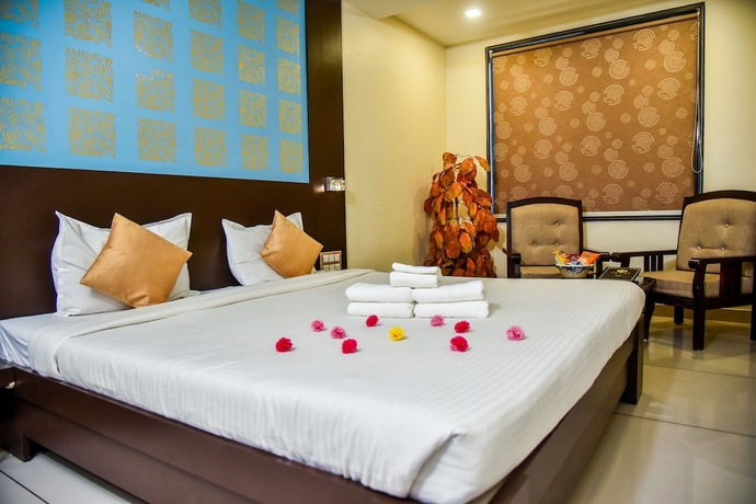 Imagen de la habitación del Hotel Tulsi Residency. Foto 14