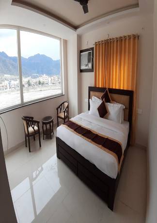 Imagen de la habitación del Hotel Tulsi, Rishikesh. Foto 8