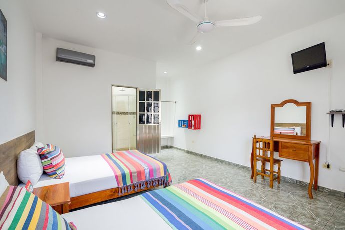 Imagen de la habitación del Hotel Tulum City. Foto 6