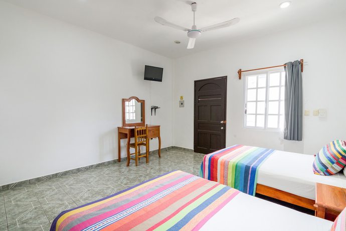 Imagen de la habitación del Hotel Tulum City. Foto 13