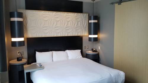 Imagen de la habitación del Hotel Tulyp, Tapestry Collection by Hilton. Foto 3