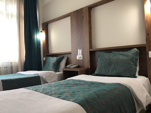 Imagen de la habitación del Hotel Tum. Foto 8