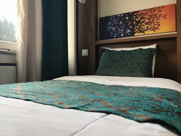 Imagen de la habitación del Hotel Tum. Foto 13