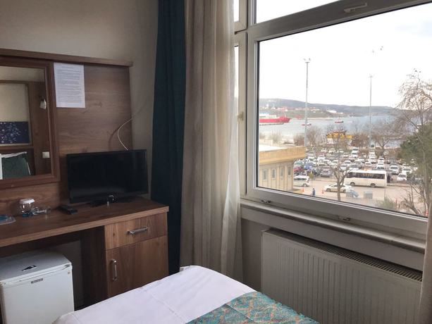 Imagen de la habitación del Hotel Tum. Foto 14