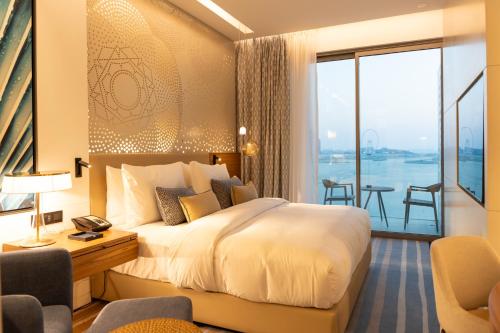 Imagen de la habitación del Hotel Tumbi Hotel Dubai The Palm, Tapestry Collection by Hilton. Foto 3