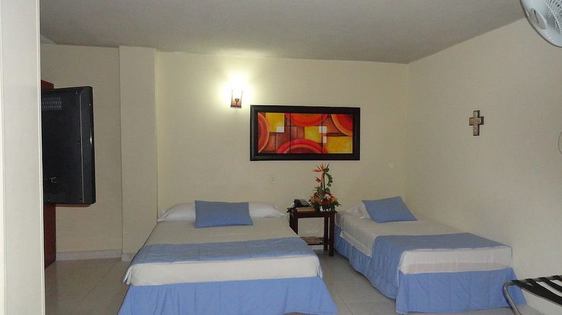 Imagen de la habitación del Hotel Tumburagua Inn. Foto 7