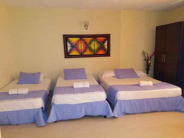 Imagen de la habitación del Hotel Tumburagua Inn. Foto 9