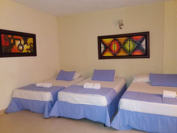 Imagen de la habitación del Hotel Tumburagua Inn. Foto 10