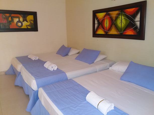 Imagen de la habitación del Hotel Tumburagua Inn. Foto 12