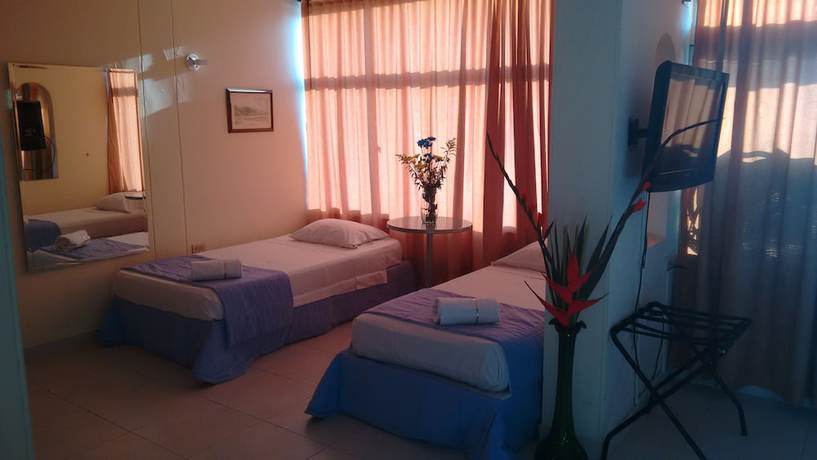 Imagen de la habitación del Hotel Tumburagua Inn. Foto 14