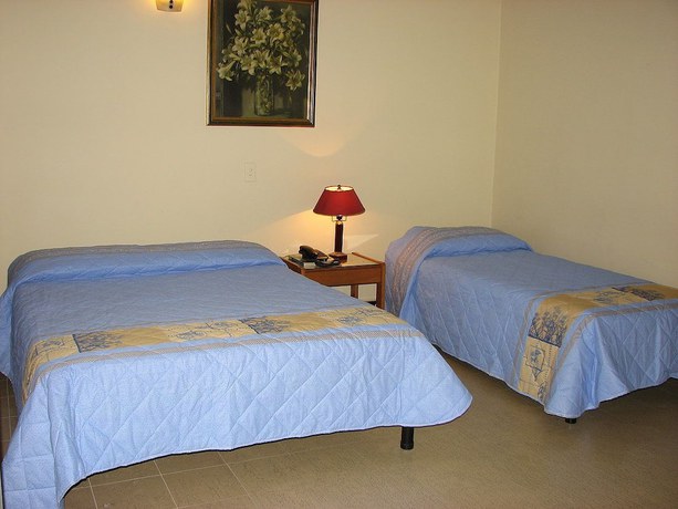 Imagen de la habitación del Hotel Tumburagua Inn. Foto 15