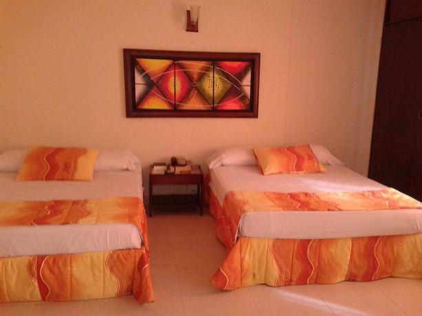 Imagen de la habitación del Hotel Tumburagua Inn. Foto 17