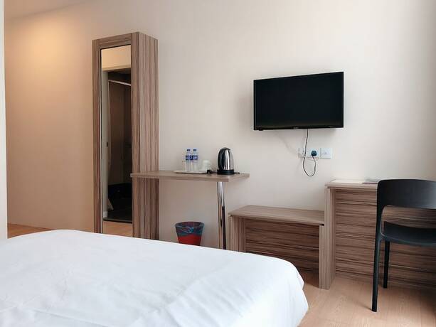 Imagen de la habitación del Hotel Tumike Hotel. Foto 14