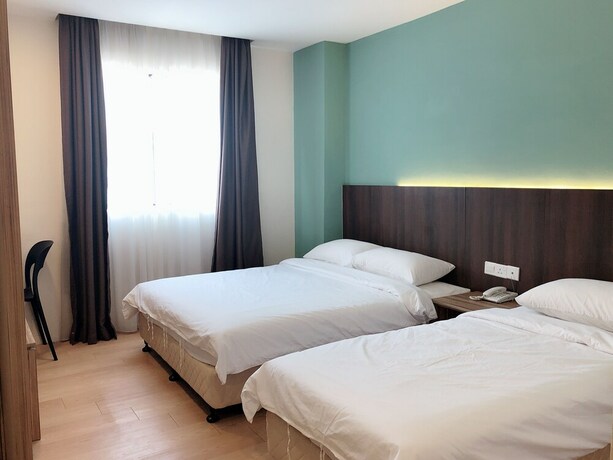 Imagen de la habitación del Hotel Tumike Hotel. Foto 21