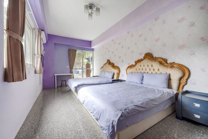 Imagen de la habitación del Hotel Tung Flowers. Foto 17