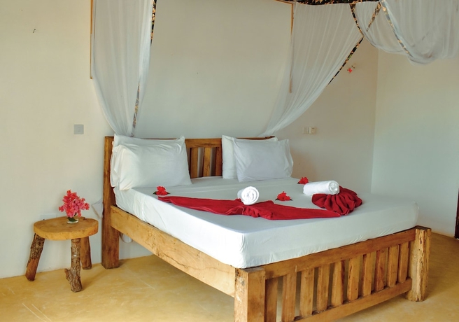 Imagen de la habitación del Hotel Tunu Beach Zanzibar. Foto 4