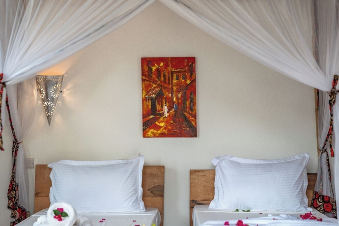 Imagen de la habitación del Hotel Tunu Beach Zanzibar. Foto 6