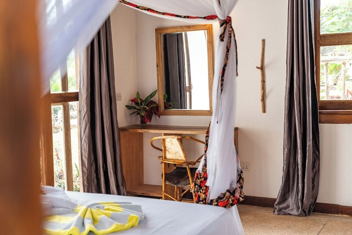 Imagen de la habitación del Hotel Tunu Beach Zanzibar. Foto 8