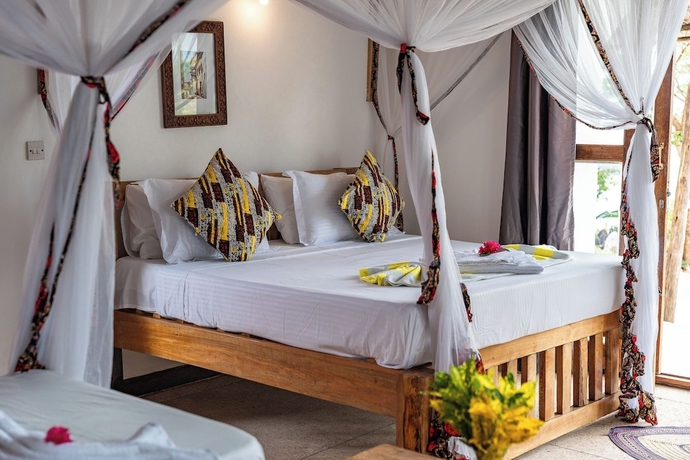 Imagen de la habitación del Hotel Tunu Beach Zanzibar. Foto 9