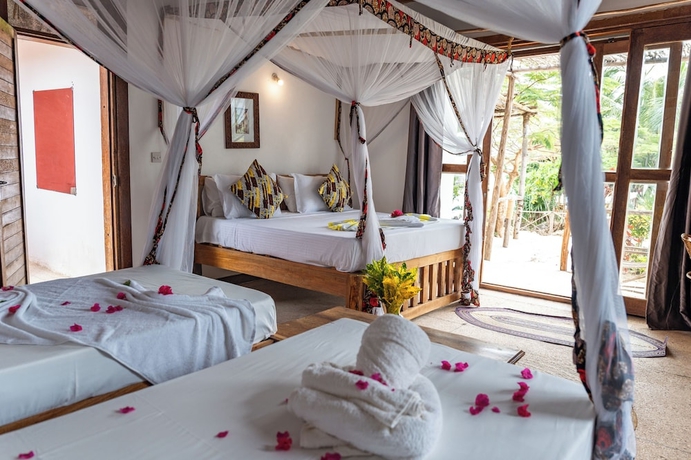 Imagen de la habitación del Hotel Tunu Beach Zanzibar. Foto 10