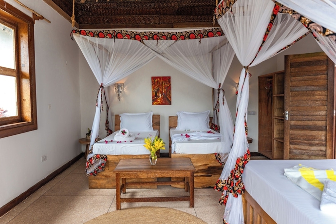 Imagen de la habitación del Hotel Tunu Beach Zanzibar. Foto 11