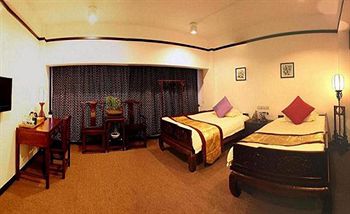 Imagen de la habitación del Hotel Tunxi Lodge. Foto 8