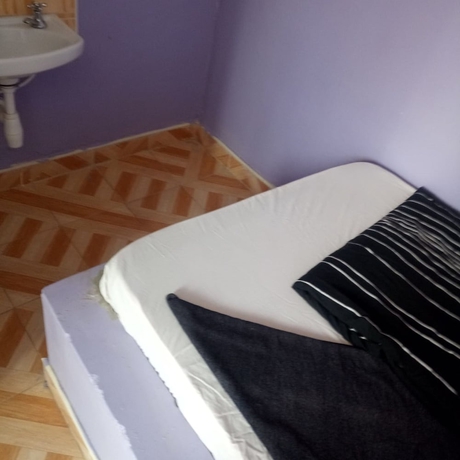 Imagen de la habitación del Hotel Tunza Guest House. Foto 6