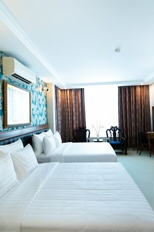 Imagen de la habitación del Hotel Tuong Vy. Foto 25