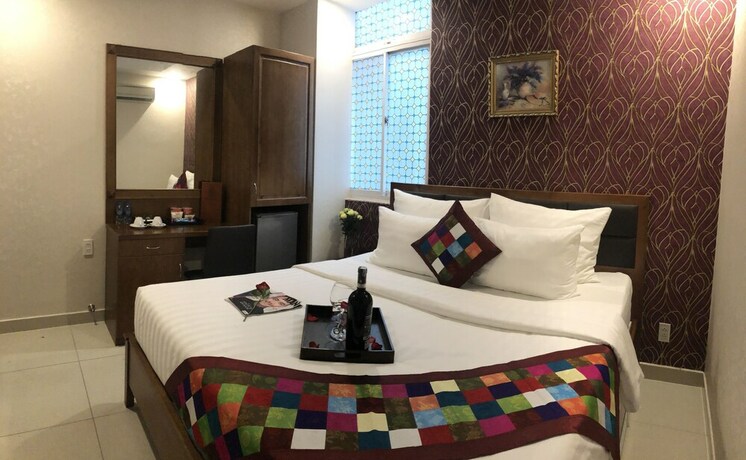 Imagen de la habitación del Hotel Tuong Vy. Foto 26