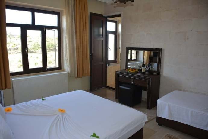Imagen de la habitación del Hotel Turabdin. Foto 5