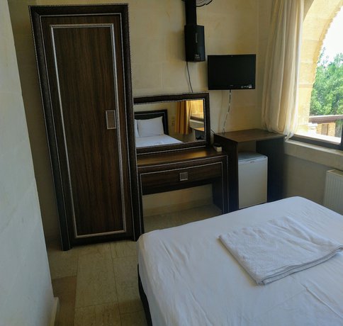 Imagen de la habitación del Hotel Turabdin. Foto 7