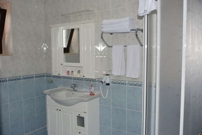 Imagen de la habitación del Hotel Turabdin. Foto 12