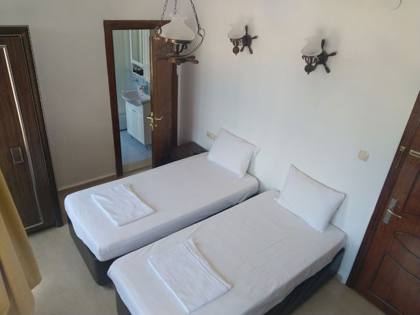 Imagen de la habitación del Hotel Turabdin. Foto 13