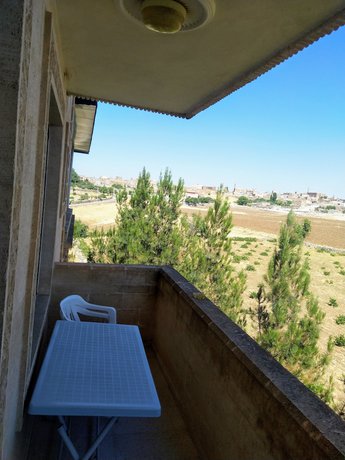Imagen de la habitación del Hotel Turabdin. Foto 14