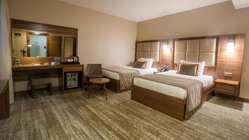 Imagen de la habitación del Hotel Turan Otel. Foto 2