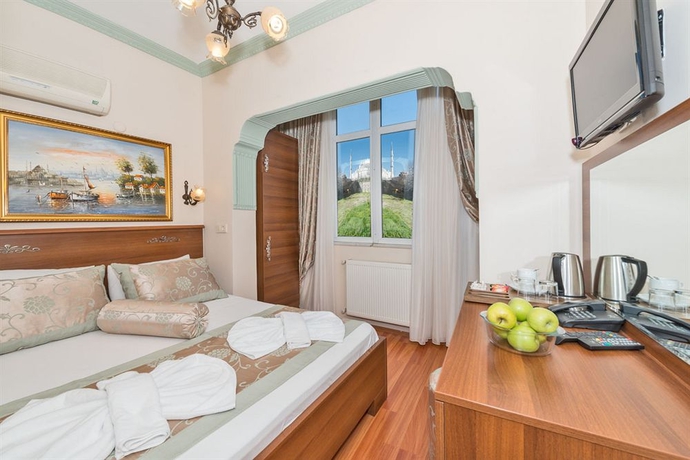 Imagen de la habitación del Hotel Turgut. Foto 13