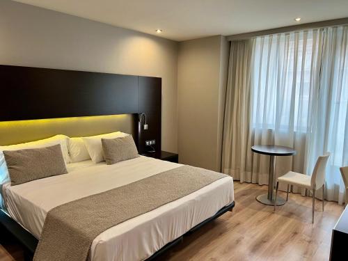 Imagen de la habitación del Hotel Turia Granada. Foto 6