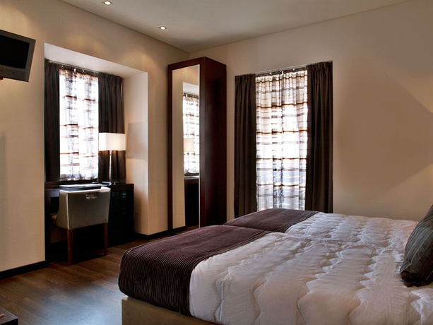 Imagen de la habitación del Hotel Turim Restauradores. Foto 11