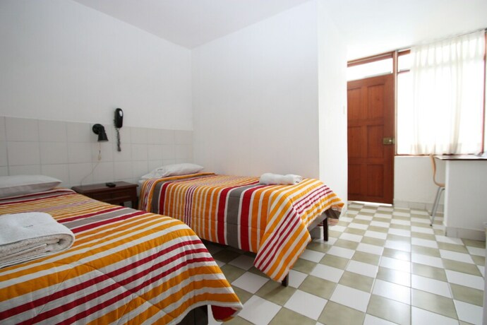 Imagen de la habitación del Hotel Turismo Bracamonte Sac. Foto 18
