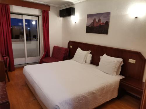 Imagen de la habitación del Hotel Turismo Miranda. Foto 20