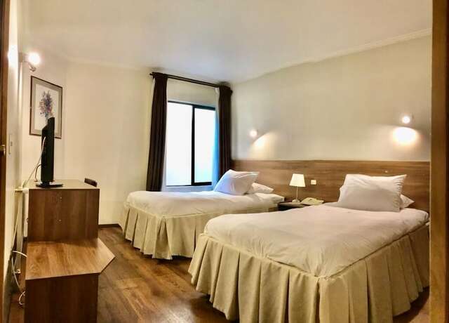 Imagen de la habitación del Hotel Turismo Temuco. Foto 21