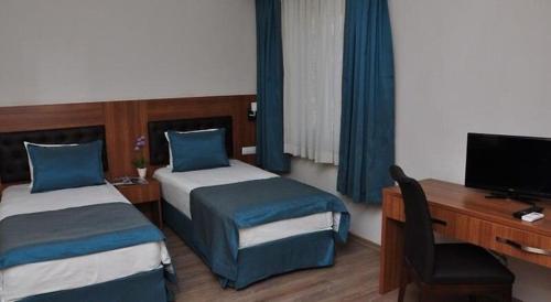 Imagen de la habitación del Hotel Turizoom Beach Resort Kumburgaz. Foto 14