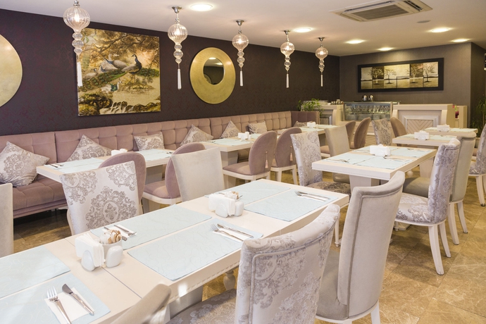 Imagen del bar/restaurante del Hotel Turkuaz Suites. Foto 4